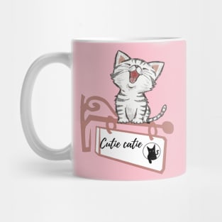 Cute cat sitting Mug